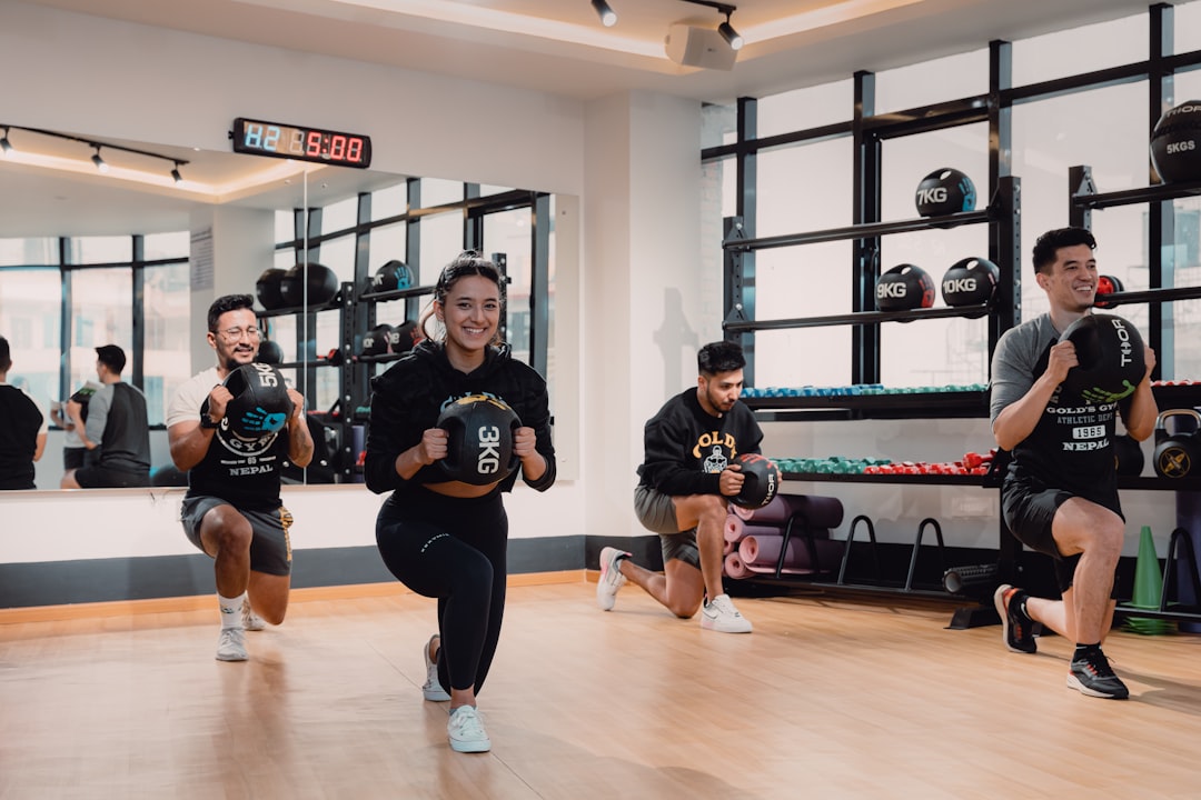 A group of people running in a gym